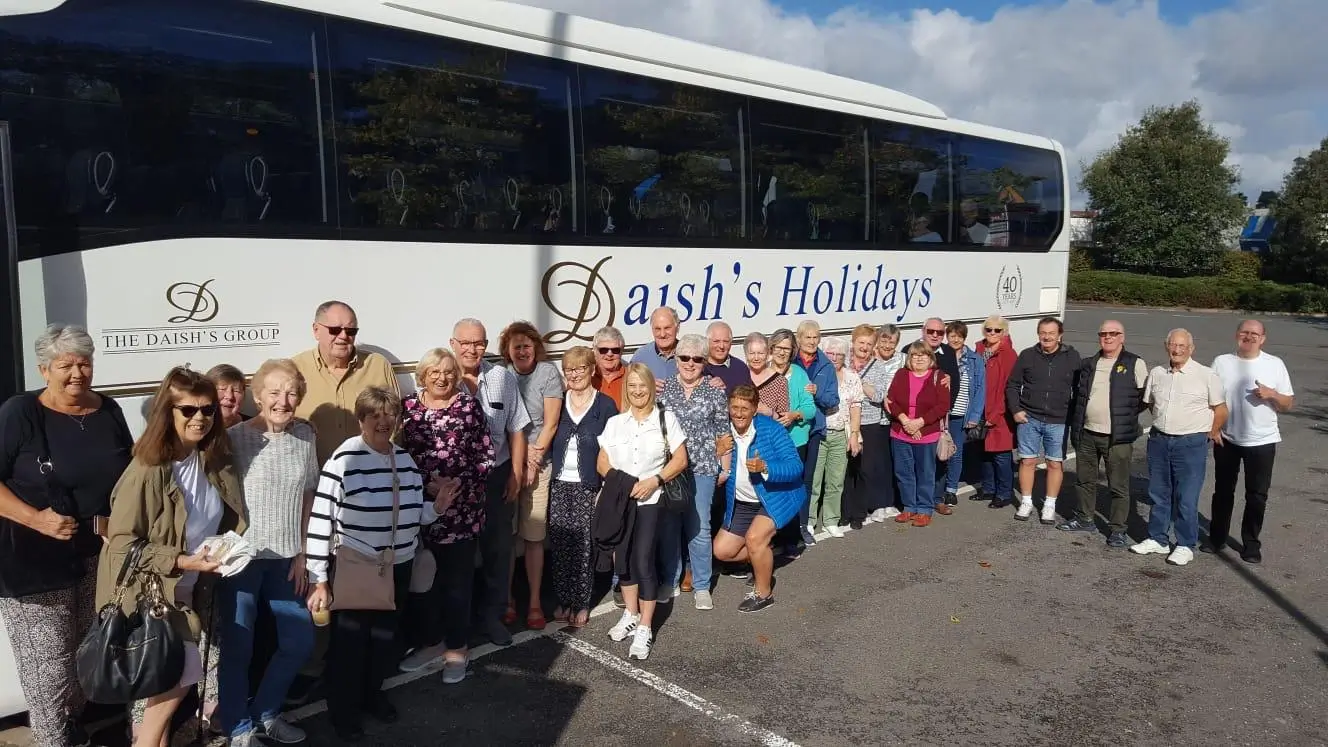 Group in front of Daish's Coach