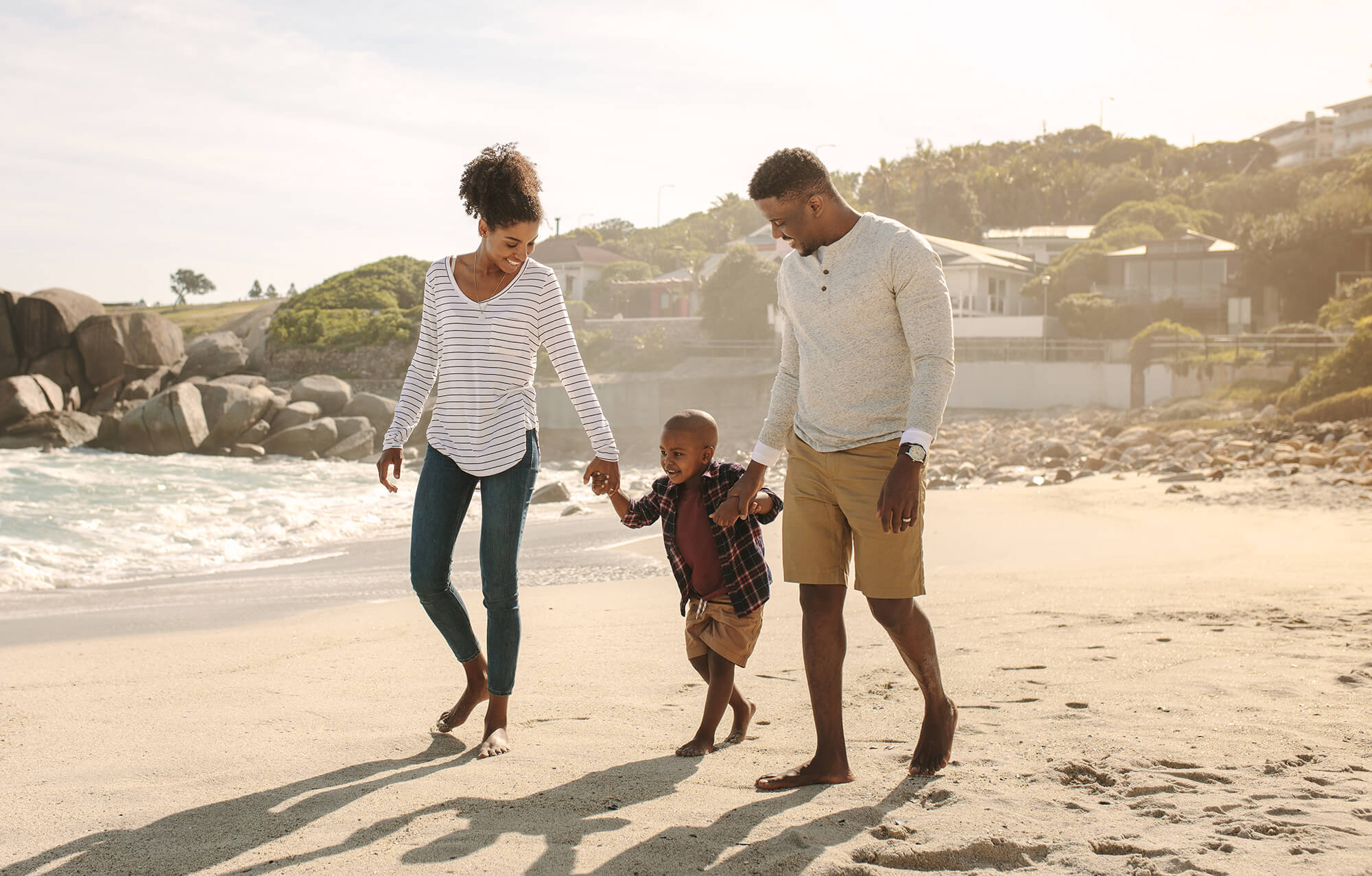 Family walking on the beach