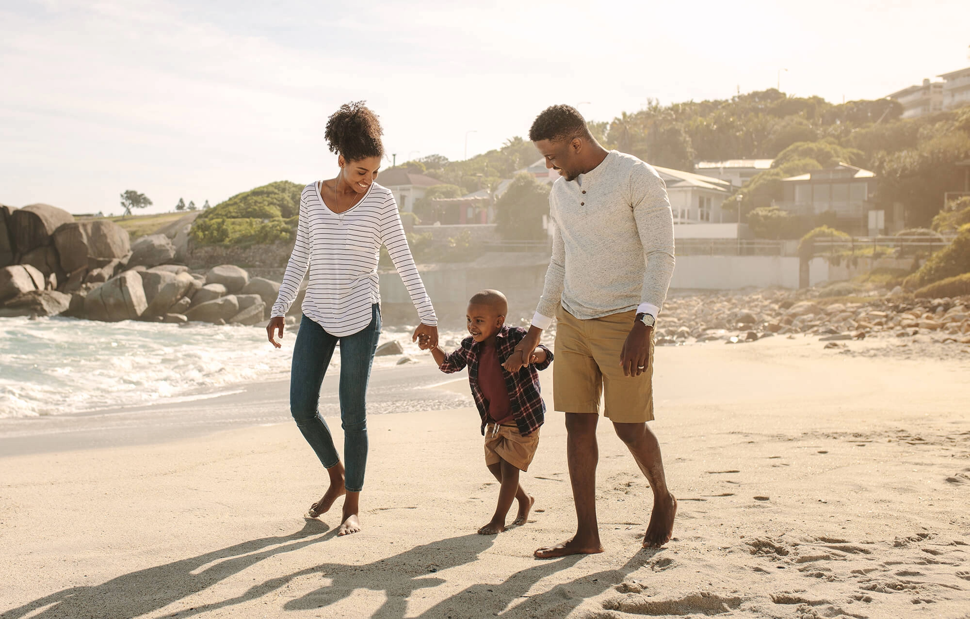 Family walking on the beach